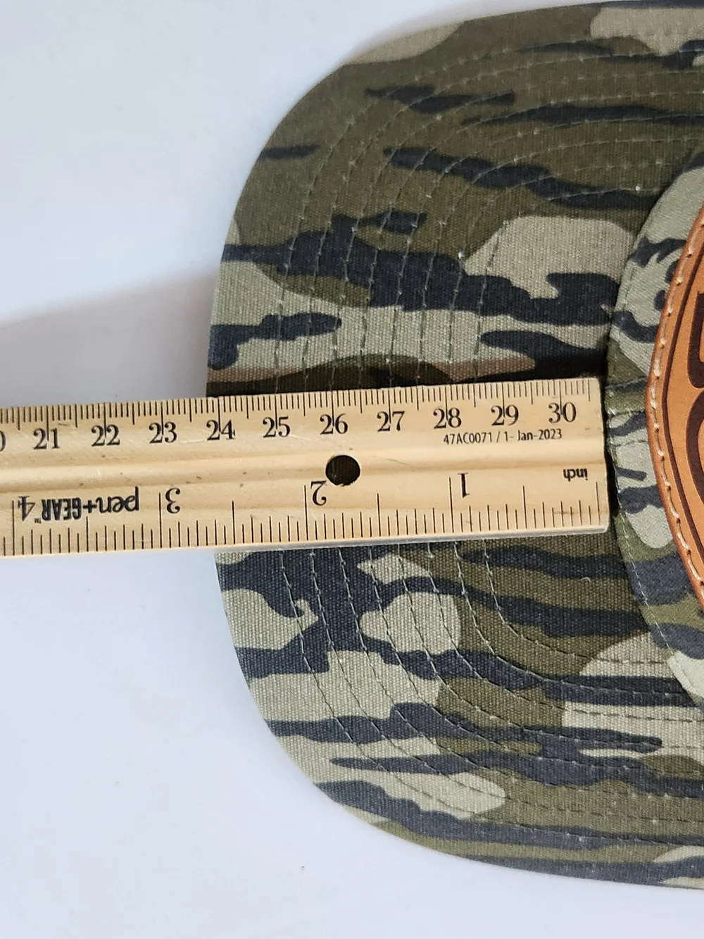 Lost Hat Co Buck Gardner Bottomland Camo Leather Patch Trucker Hat